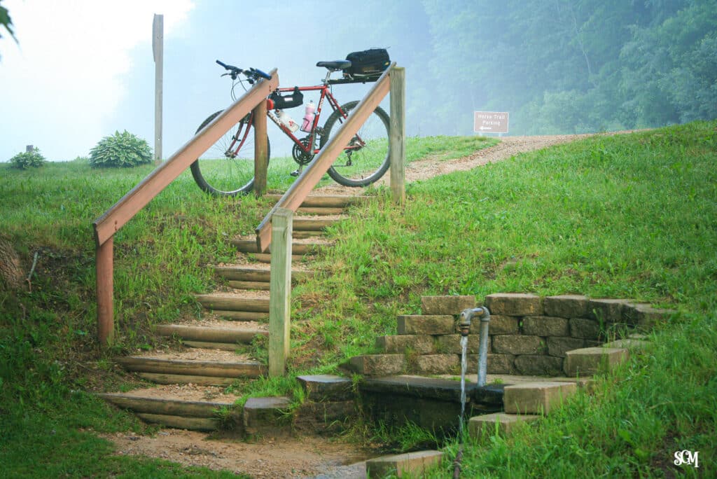 Bike and stairway leading down to the well.